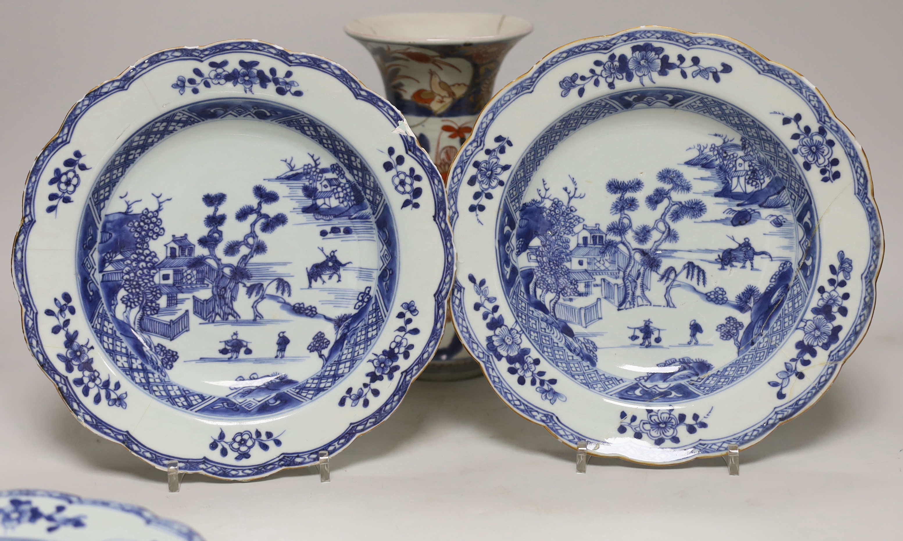 Three 18th century Chinese blue and white plates and an Imari flared vase, 22cm